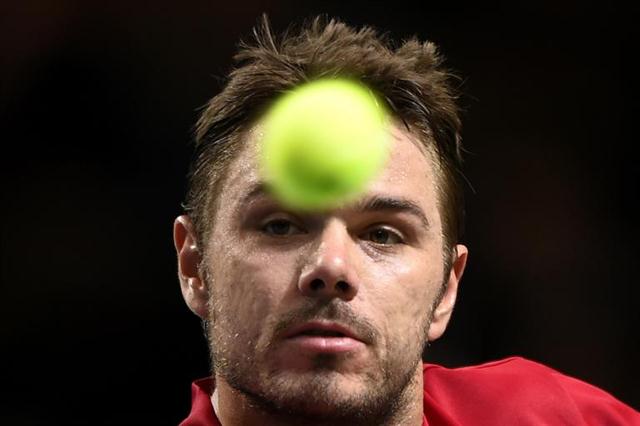 Tay vợt Thụy Sĩ Stanislas Wawrinka trong trận đấu với Mikhail Kukushkin Kazak ở tứ kết của Davis Cup tại Geneva