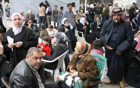 Đối với người tị nạn Iraq, đường trở về nhà giờ vẫn quá xa vời. Ảnh Reuters