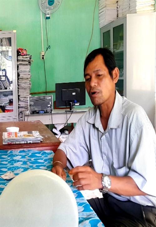 Gã thầy cúng kiêm lang băm Đinh Văn Ngâu tại cơ quan điều tra.