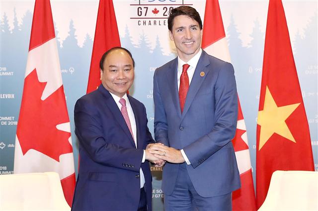 Thủ tướng Nguyễn Xuân Phúc và Thủ tướng Canada Justin Trudeau. Ảnh: VGP/Quang Hiếu
