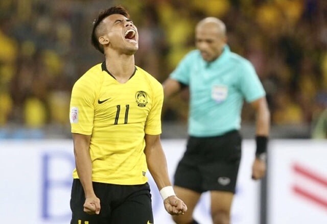 Vẻ tiếc nuối của một cầu thủ Malaysia.