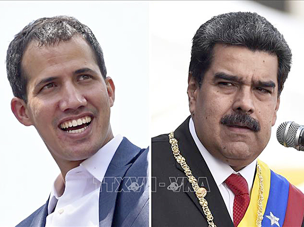 Tổng thống Venezuela Nicolas Maduro (phải) và lãnh đạo đối lập Juan Guaido.