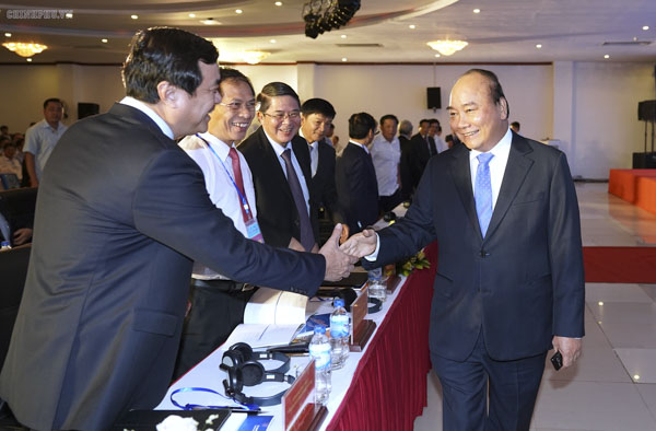 Thủ tướng dự Hội nghị xúc tiến đầu tư Quảng Ngãi. Ảnh: QUANG HIẾU
