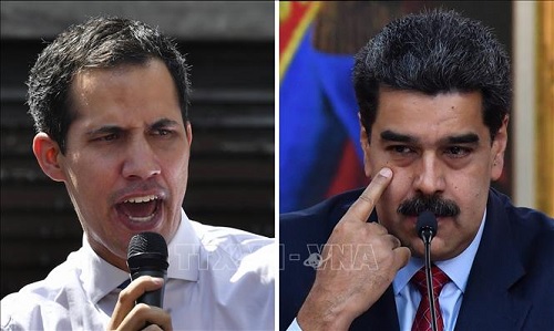 Tổng thống Venezuela Nicolas Maduro (phải) và lãnh đạo đối lập Juan Guaido. (Ảnh: AFP/TTXVN)