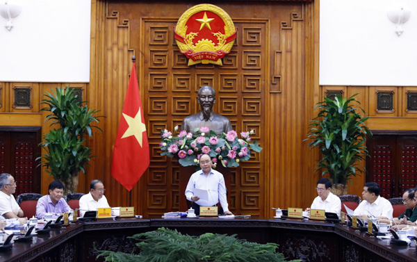 Thủ tướng Nguyễn Xuân Phúc, Trưởng Tiểu ban Kinh tế - Xã hội Đại hội đại biểu toàn quốc lần thứ XIII của Đảng phát biểu.  Ảnh: Thống Nhất