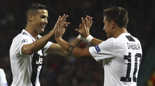 Dybala (phải) là người kiến tạo để Ronaldo ghi 2 bàn gần nhất.