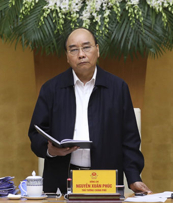 Thủ tướng Nguyễn Xuân Phúc phát biểu  tại cuộc họp. Ảnh: THỐNG NHẤT 