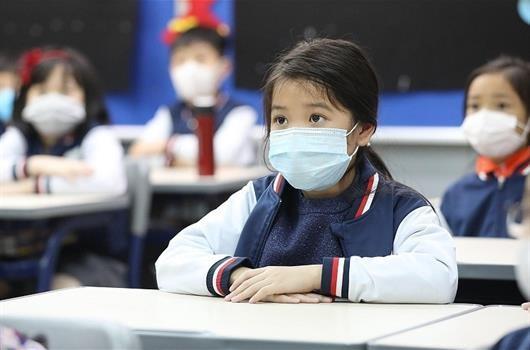 Thực hiện nghiêm đeo khẩu trang trên đường đến trường - Ảnh minh họa
