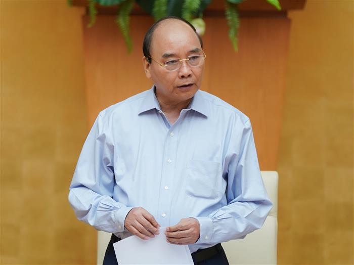 Thủ tướng Nguyễn Xuân Phúc phát biểu tại cuộc họp - Ảnh: VGP/Quang Hiếu