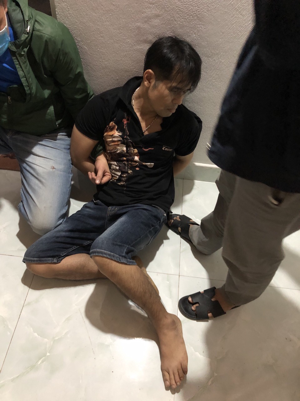 Đối tượng Nguyễn Quốc Huy lúc bị bắt
