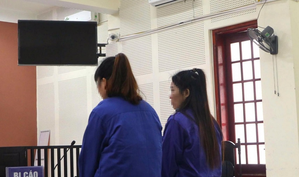 Hai bị cáo tại phiên toà