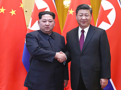 Chủ tịch Trung Quốc Tập Cận Bình hội đàm với nhà lãnh đạo Kim Jong-un. 