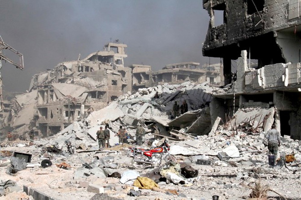 Cảnh đổ nát sau các cuộc xung đột tại phía Nam thủ đô Damascus. 
