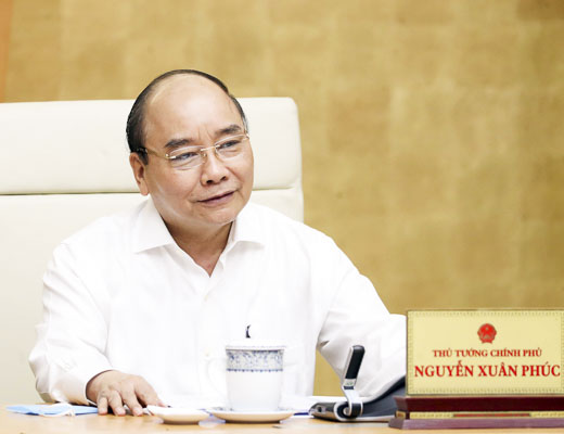 Thủ tướng Nguyễn Xuân Phúc phát biểu tại cuộc họp. Ảnh: THỐNG NHẤT 