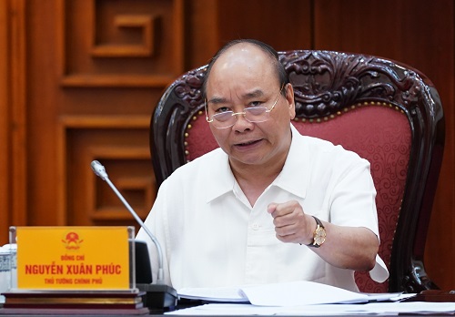 Thủ tướng Nguyễn Xuân Phúc phát biểu tại cuộc họp. Ảnh: QUANG HIẾU