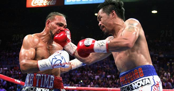 Thurman (trái) từng bị Pacquiao đánh bại.
