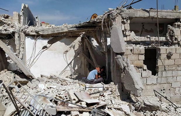 Một ngôi nhà bị phá hủy ở ngoại ô Damascus do các cuộc không kích của Israel. 