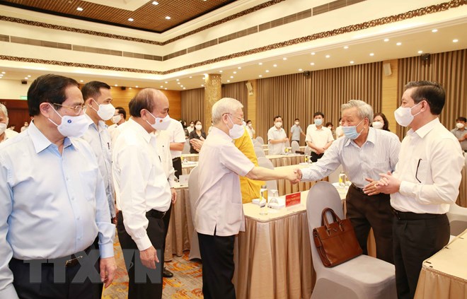 Tổng Bí thư Nguyễn Phú Trọng, Chủ tịch nước Nguyễn Xuân Phúc, Thủ tướng Phạm Minh Chính với các  đại biểu dự hội nghị.