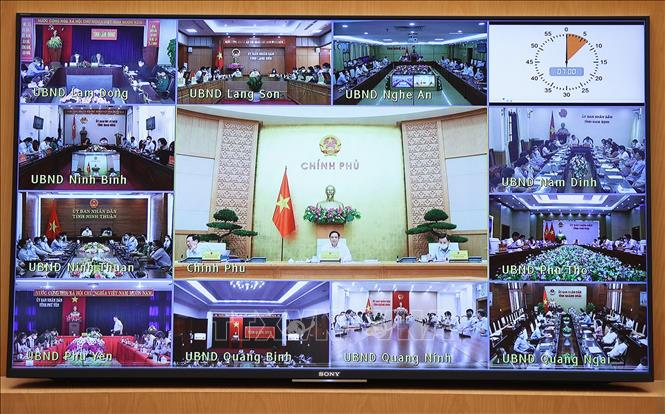 Các địa phương tham dự Phiên họp Chính phủ thường kỳ tháng 9 theo hình thức trực tuyến. Ảnh: Dương Giang/TTXVN