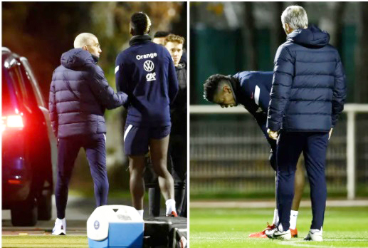 Pogba tập tễnh rời sân tập.