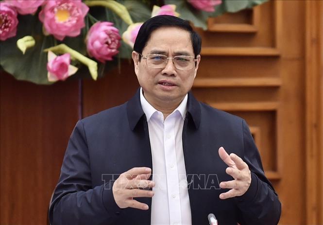 Thủ tướng Phạm Minh Chính phát biểu kết luận cuộc họp về thúc đẩy sản xuất vắc xin. Ảnh: TTXVN