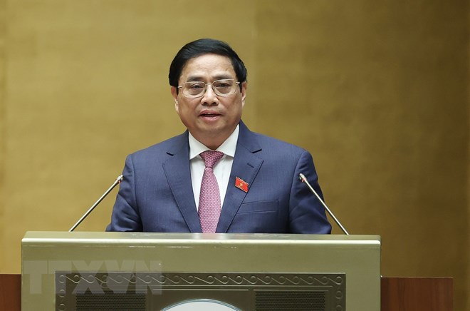 Thủ tướng Phạm Minh Chính trình bày Báo cáo kết quả thực hiện kế hoạch phát triển kinh tế - xã hội năm 2022; dự kiến kế hoạch phát triển kinh tế - xã hội năm 2023.