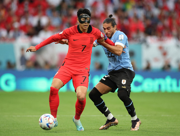 Kết quả hòa 0-0 phản ánh đúng cục diện trận đấu giữa Hàn Quốc (bên trái) và Uruguay.