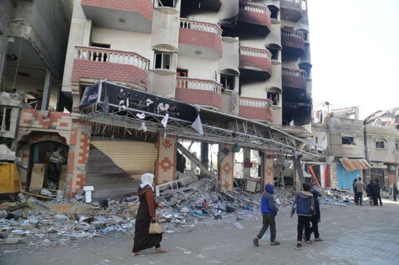 Các tòa nhà bị phá hủy sau cuộc không kích của Israel xuống Dải Gaza ngày 19/1.