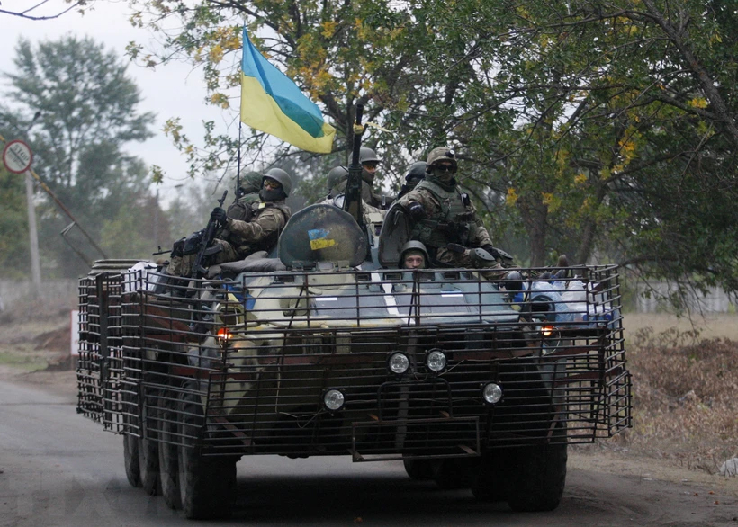 Binh sĩ Ukraine tuần tra tại thành phố Kramatorsk ở vùng Donetsk.