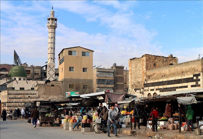 Người dân tại một khu chợ ở Hama, Syria.